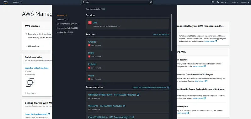 To access IAM service go to the search bar in the AWS console and type IAM and click on the IAM button
